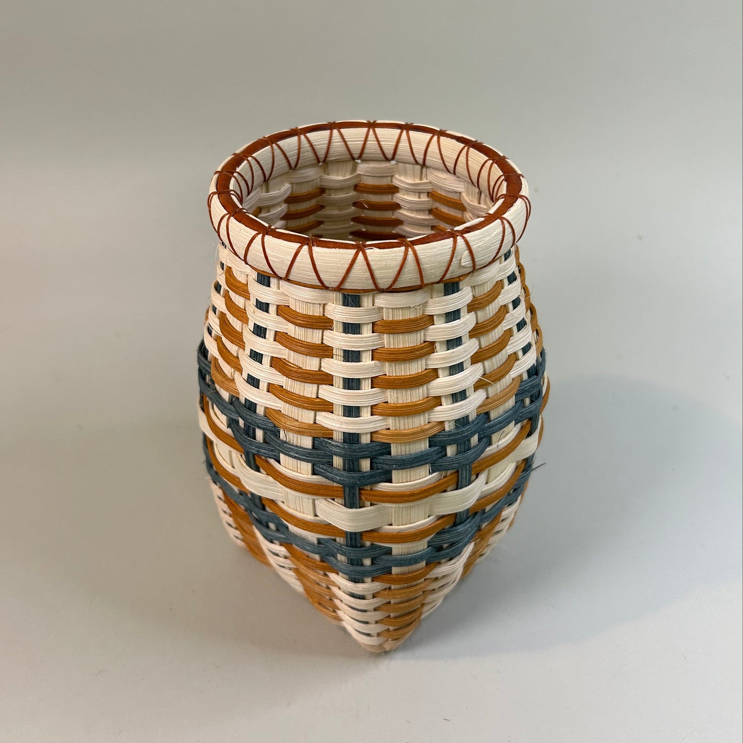 Orange and Teal Bookshelf Basket