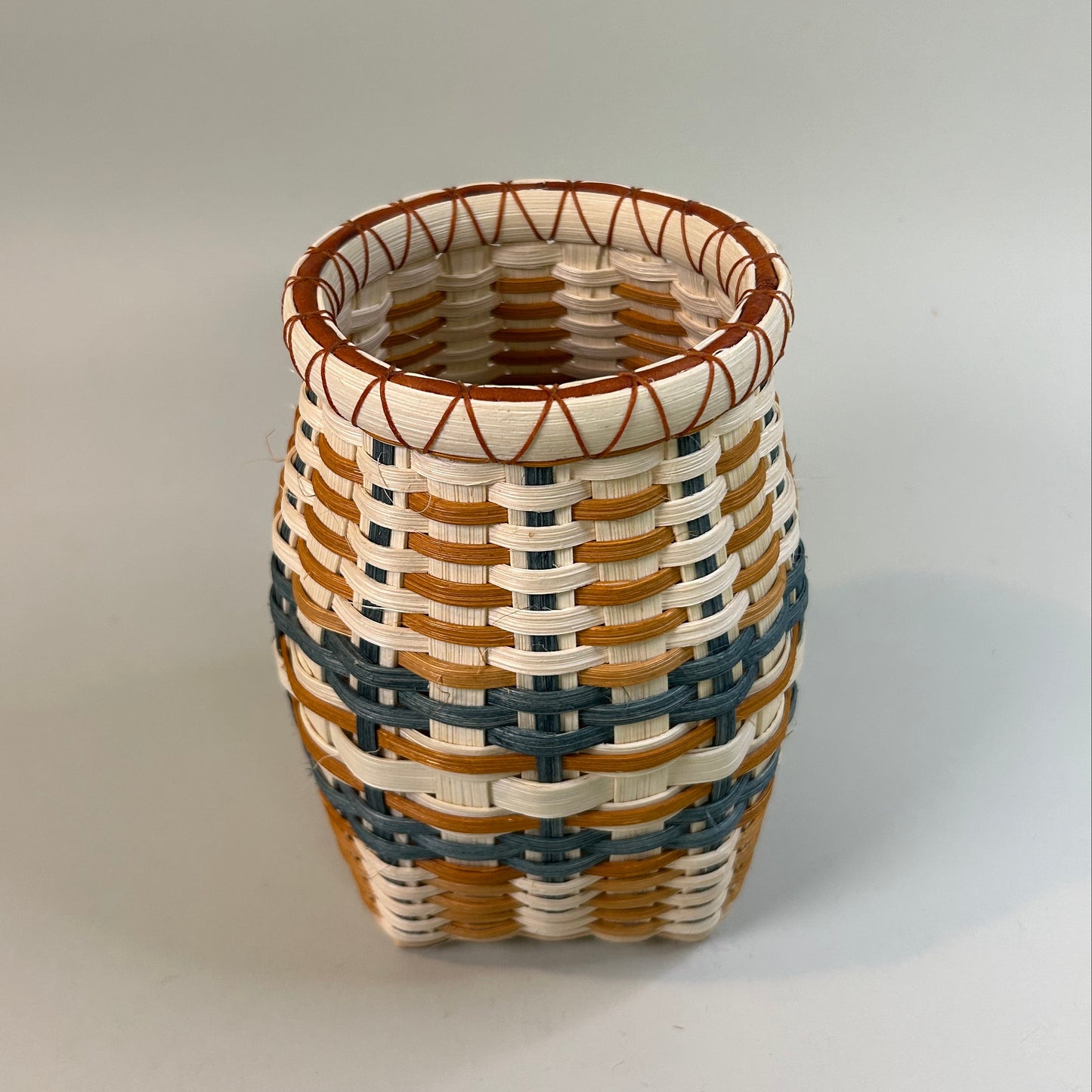 Orange and Teal Bookshelf Basket